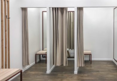 A row of dressing booths for trying on clothes in a store